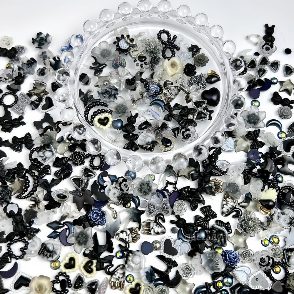 Quezadyl charms placed on acrylic nail swatches demonstrating finished look