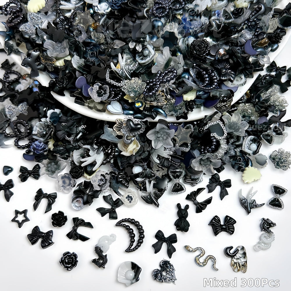 Quezadyl mixed stars moons and hearts on black backdrop showing design variety