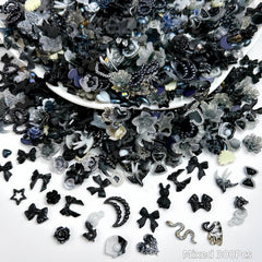 Quezadyl mixed stars moons and hearts on black backdrop showing design variety