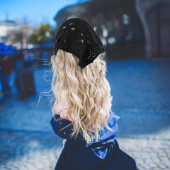 Qulkws model wearing black headscarf demonstrating secure fit advantage