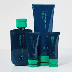 R+Co BLEU De Luxe shampoo texture on hand demonstrating lightweight glide