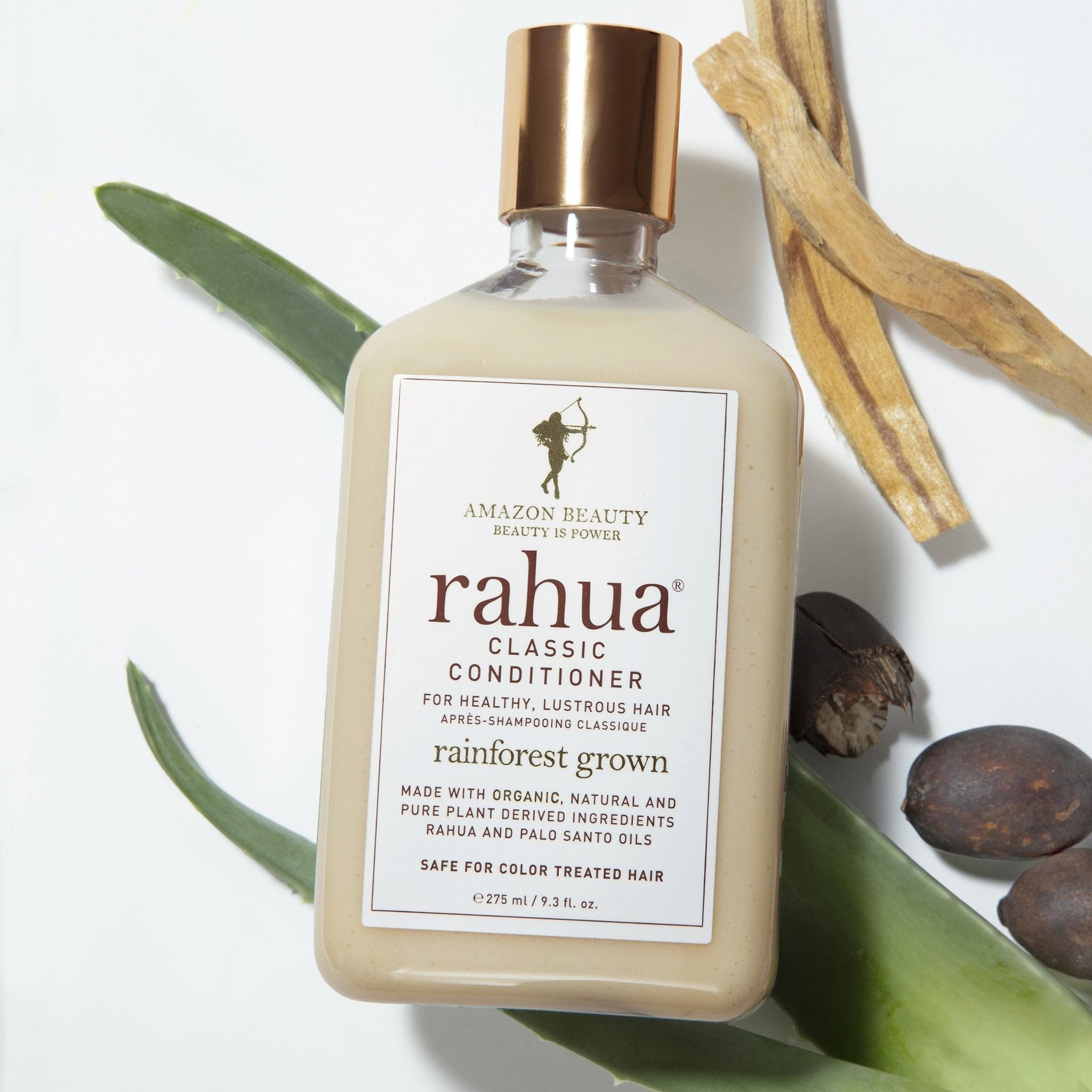 Rahua conditioner being applied in the shower for efficient cleansing and conditioning