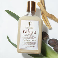 Rahua conditioner being applied in the shower for efficient cleansing and conditioning