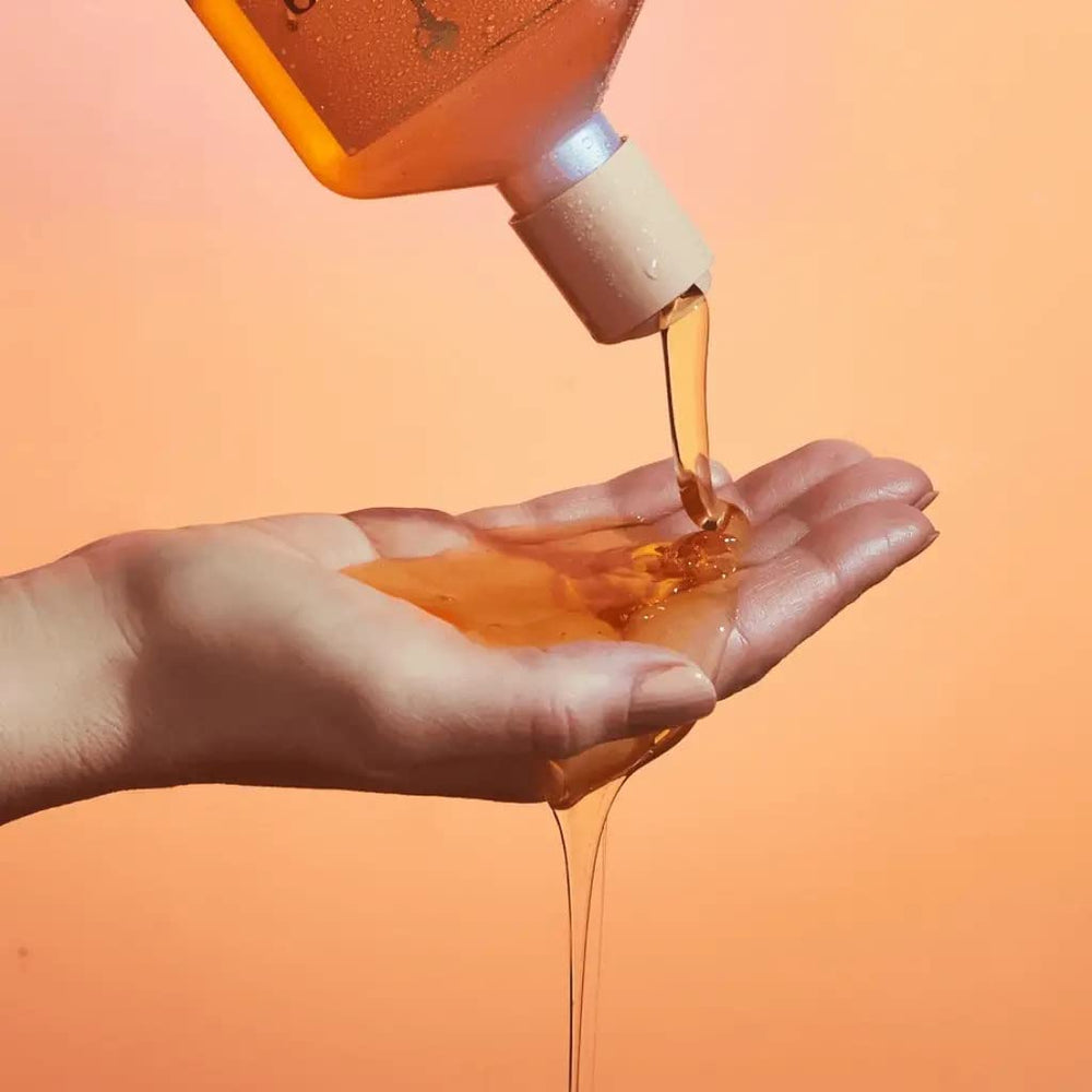 Rahua shampoo in shower on medium hair showing foaming action and conditioning
