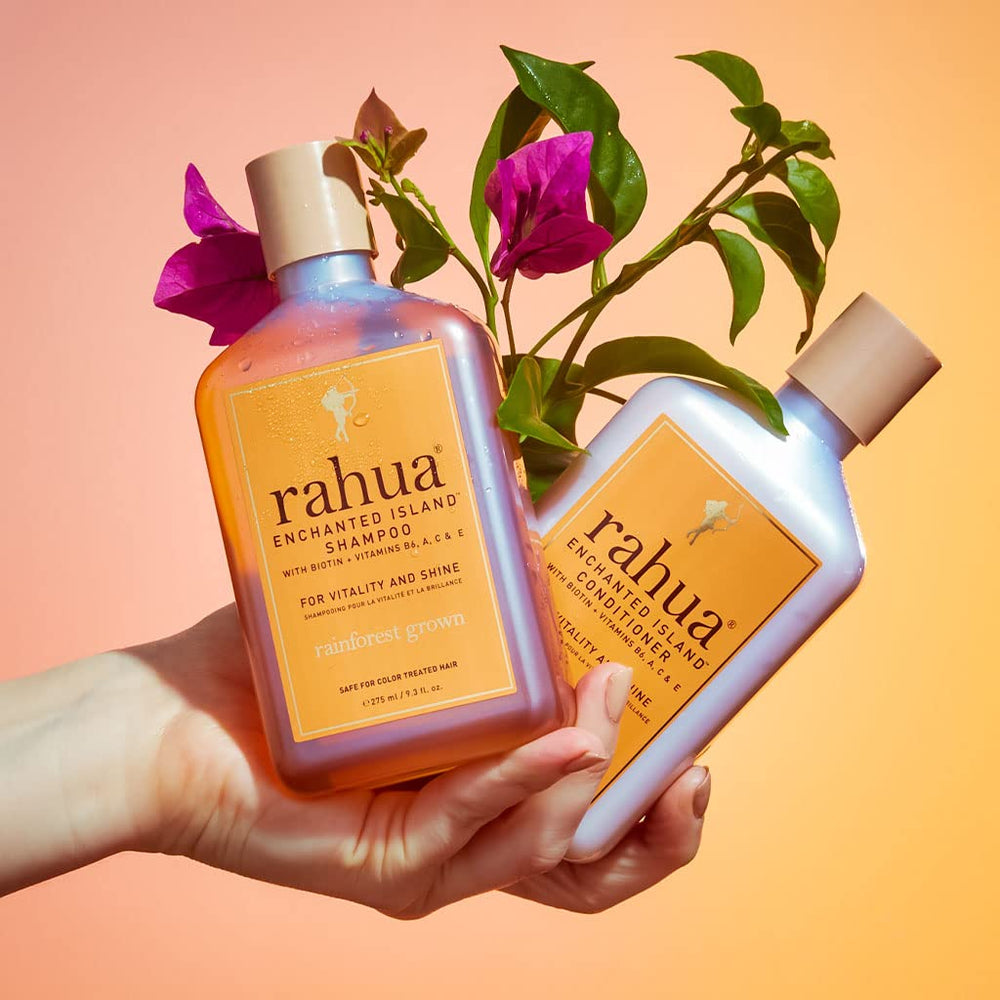 Rahua conditioner on a bathroom shelf conveying everyday luxury benefit