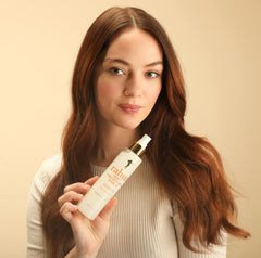 Rahua fine spray texture on a hair strand for even coverage