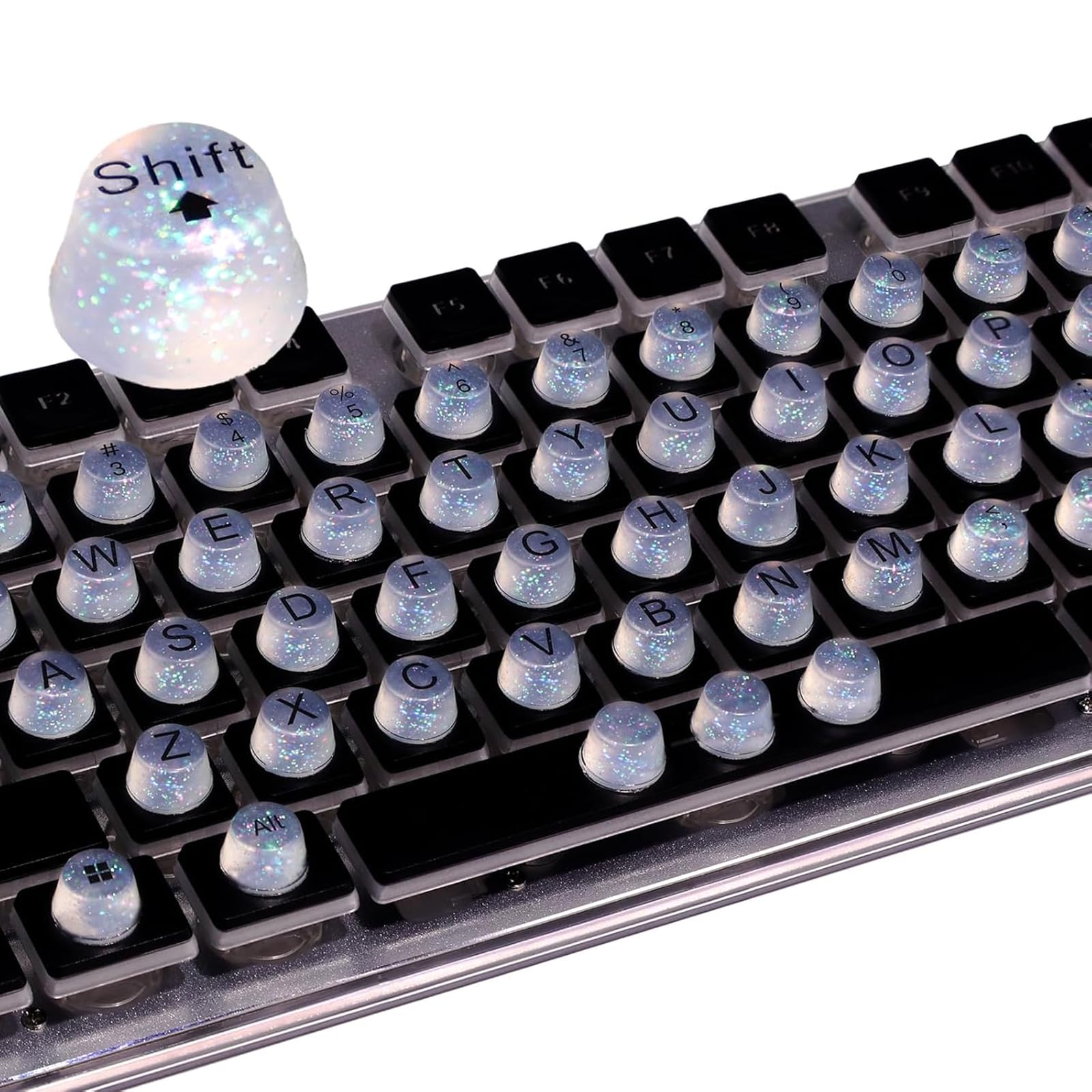 Raised Button front packaging showing 64 clear glitter keycaps and benefits