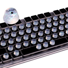 Raised Button front packaging showing 64 clear glitter keycaps and benefits