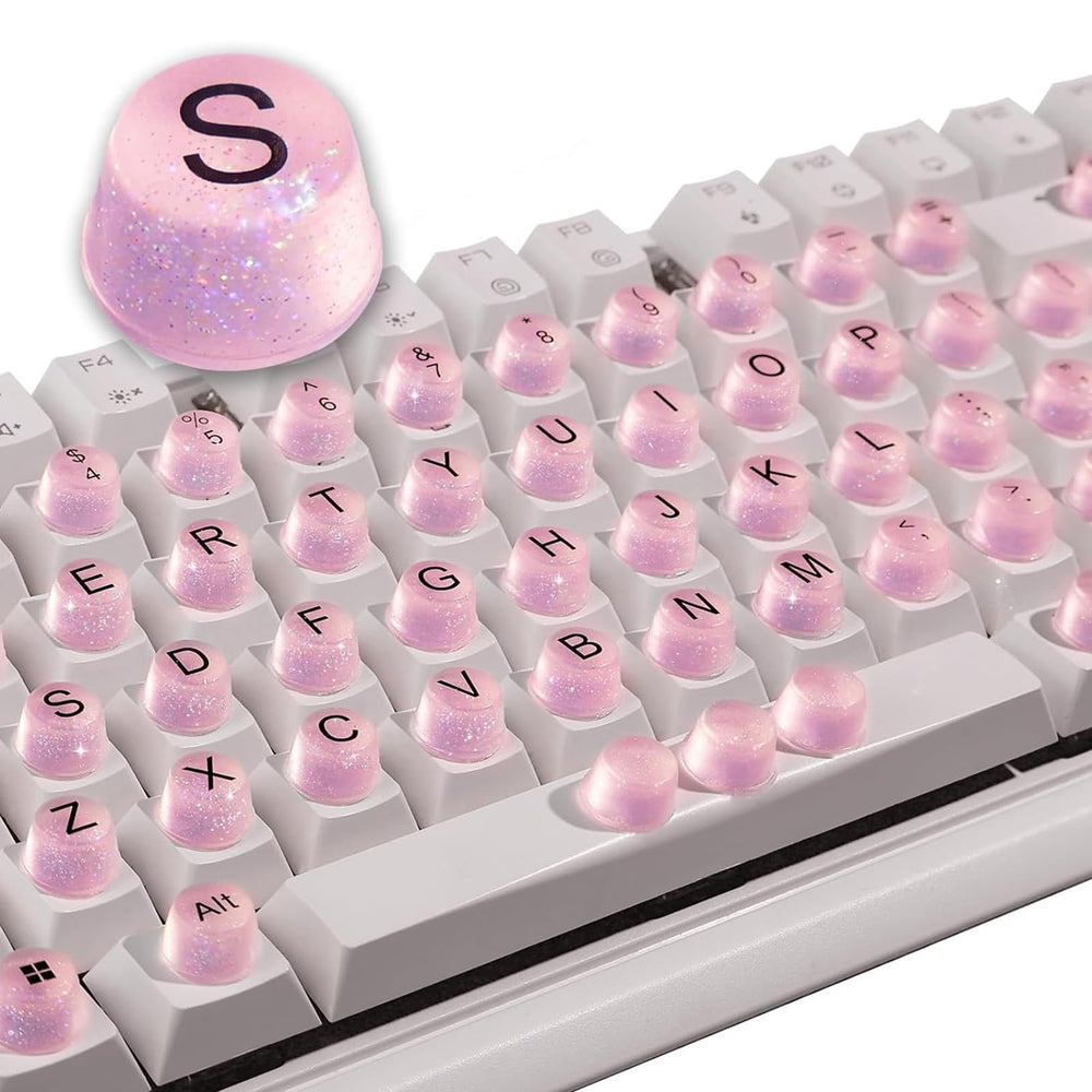 Raised Button front packaging showing 64 pink silicone keycaps and sparkle benefit