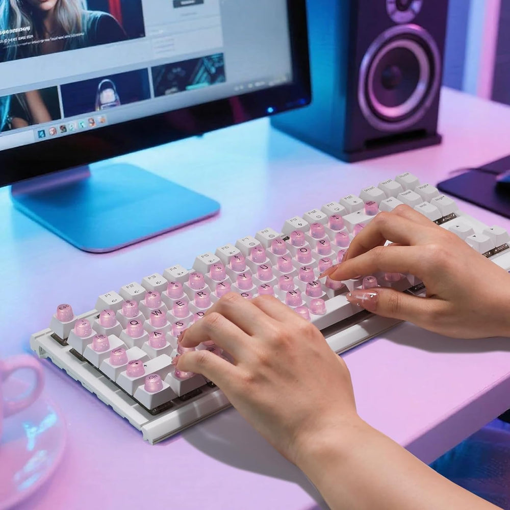 Raised Button in-use typing with long nails demonstrating snag prevention