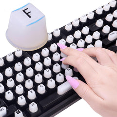 Raisetip front packaging showing 130 white raised silicone keycaps and contents for quick setup