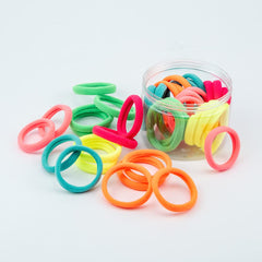 Random Mood front packaging showing 48 luminous hair ties and gift box benefit organization
