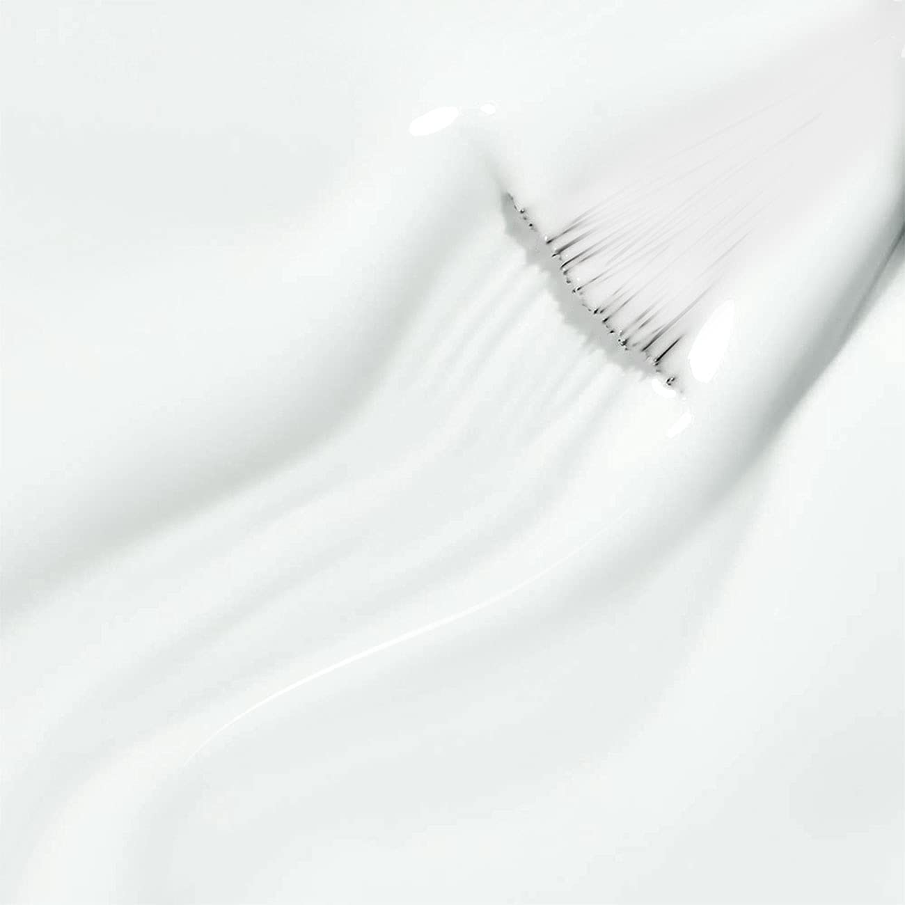 RARJSM brush stroke swatch displaying opaque white coverage benefit