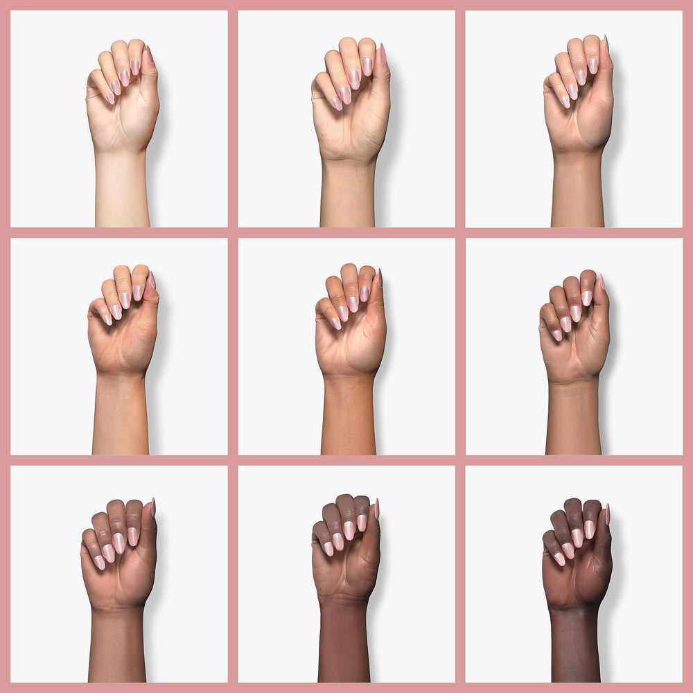 RARJSM cured manicure on hand showcasing glossy nude-pink shimmer and durability