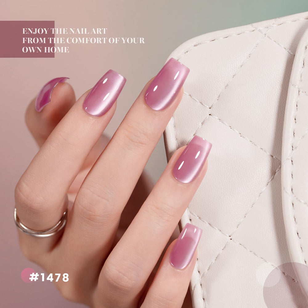 RARJSM model hand wearing finished pink cat-eye manicure, demonstrates salon-quality results
