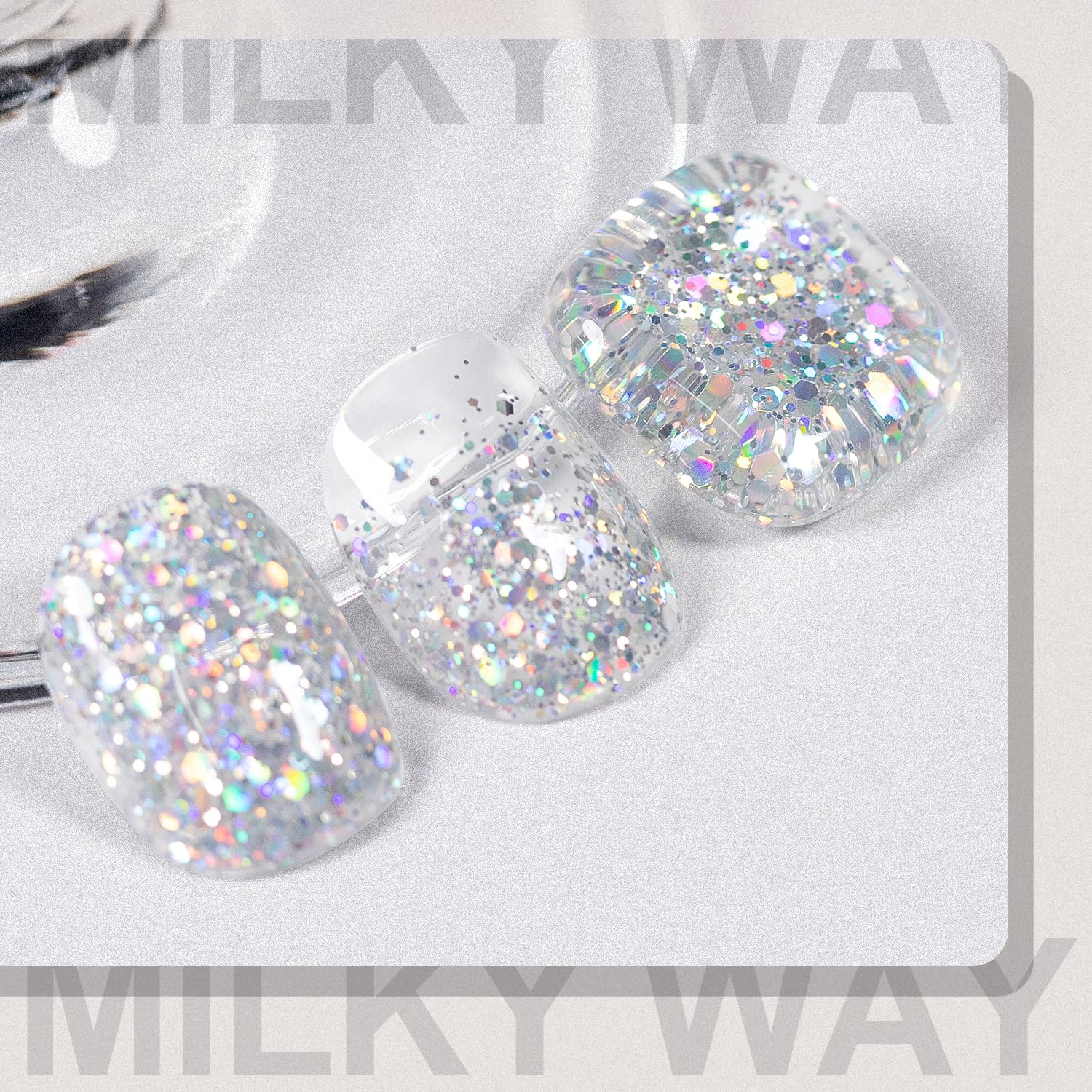 RARJSM nail swatch on model hand displaying dramatic glitter effect