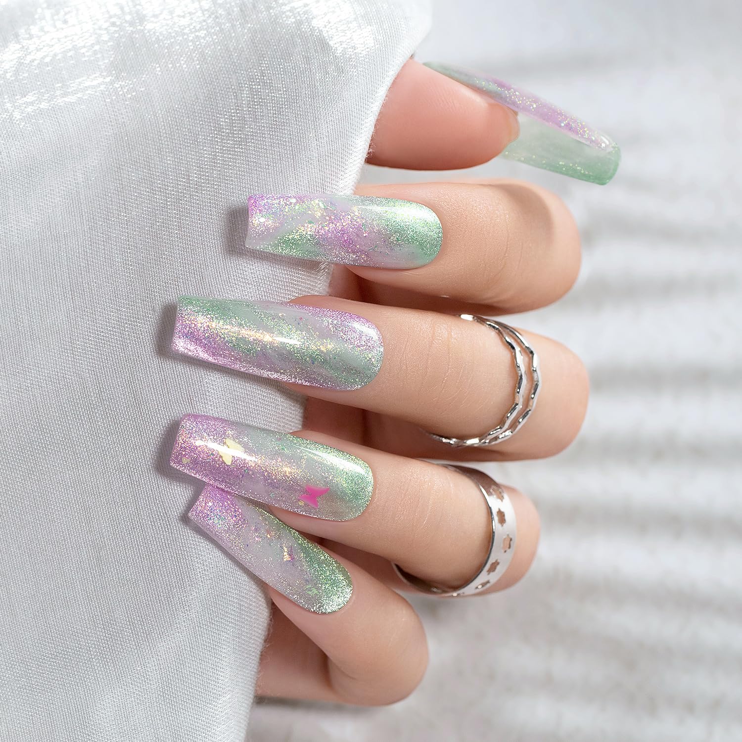 RARJSM mermaid blue nails in use showing vibrant galaxy shimmer and long-lasting shine
