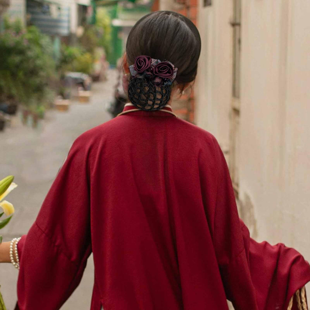 ravlzors in hair high bun demonstrating secure stylish updo benefit