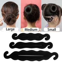 Ravlzors styled ballet bun on model, elegant secure updo
