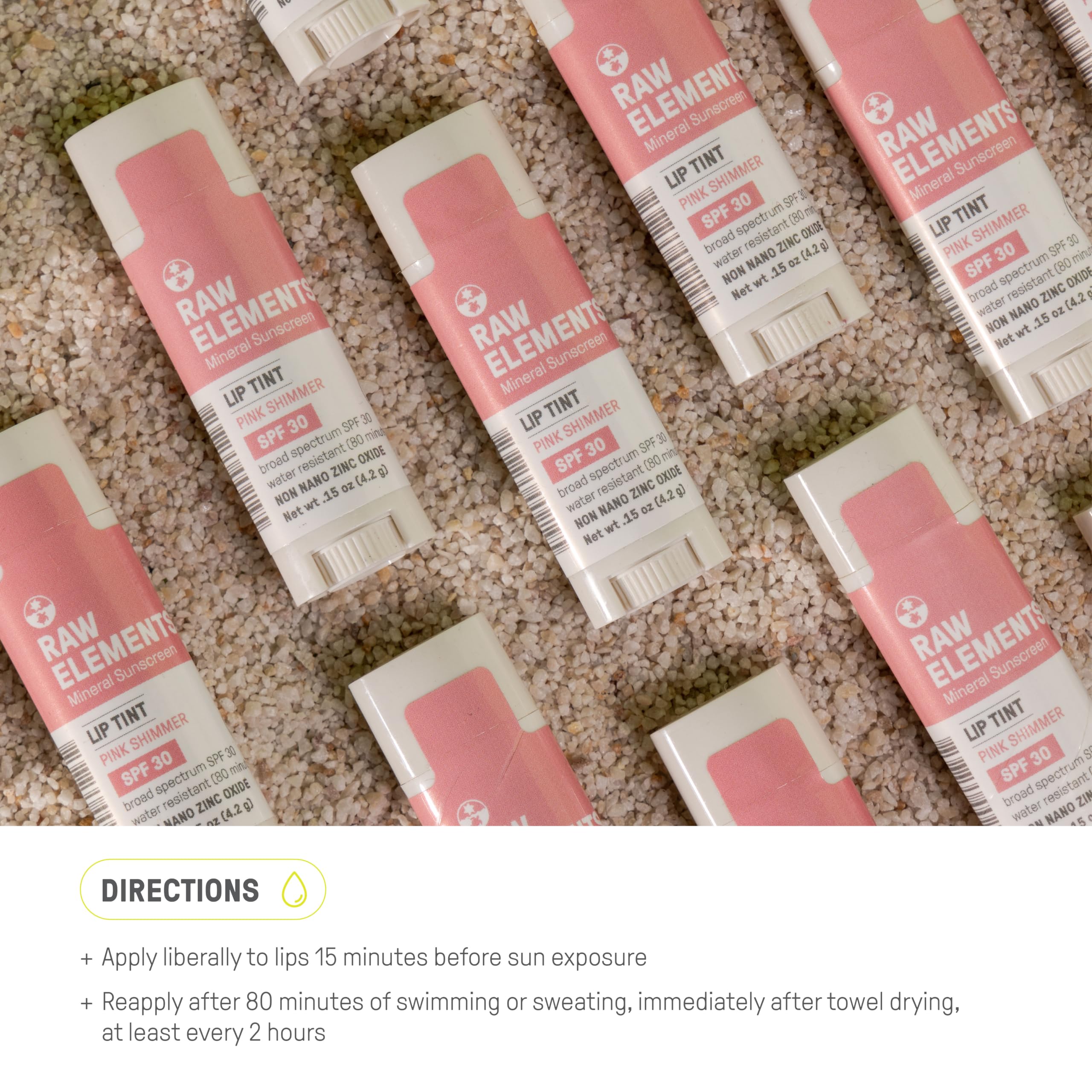 Raw Elements lip shimmer lifestyle on beach showing reef-friendly outdoor protection