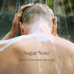 RAW SUGAR bottle in shower setting conveying refreshing daily-use vibe and scent uplift