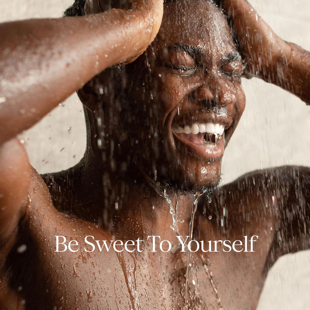 RAW SUGAR body wash poured onto washcloth to illustrate easy application and hydration