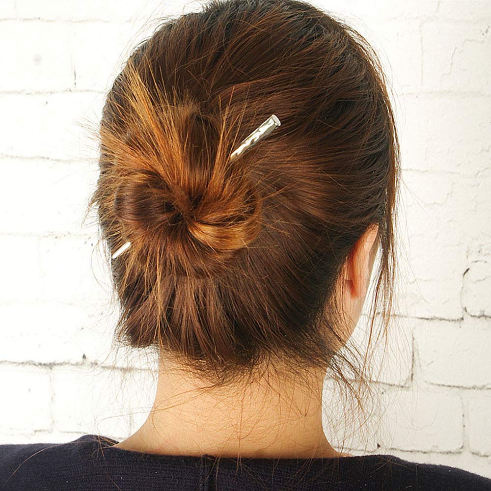 RAYNAG used in a twisted chignon showing strong secure styling