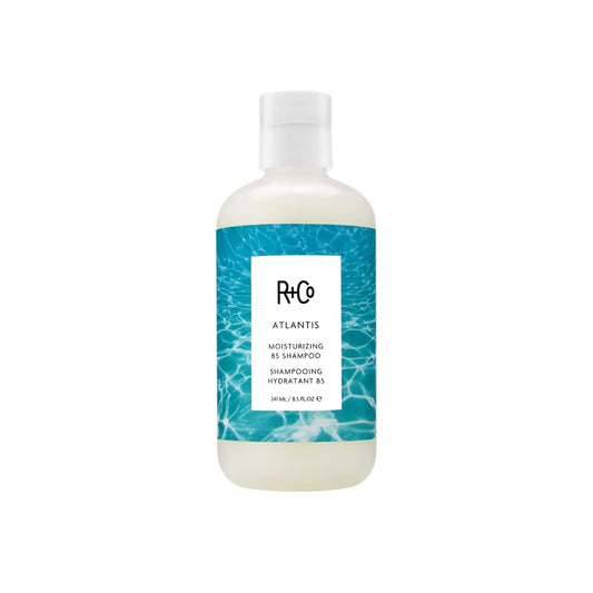 R+Co Atlantis shampoo front bottle showing label and hydration benefit