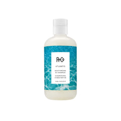 R+Co Atlantis shampoo front bottle showing label and hydration benefit
