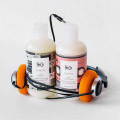 R+Co Cassette in-shower use showing curls being gently detangled and nourished