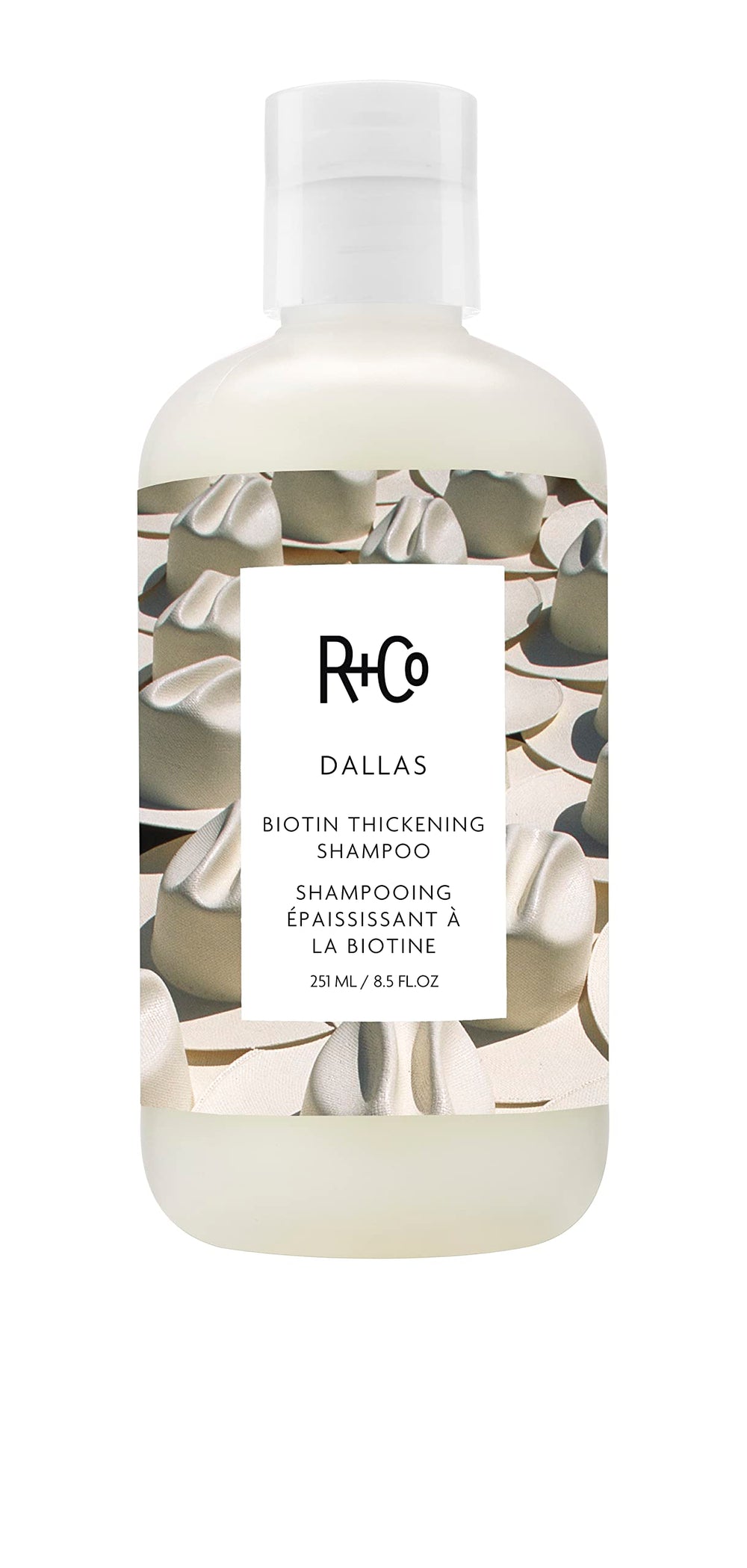 R+Co Dallas front bottle showing sleek packaging and product benefit