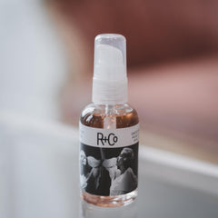 R+Co two way mirror pump and cap detail highlighting precise dispensing benefit