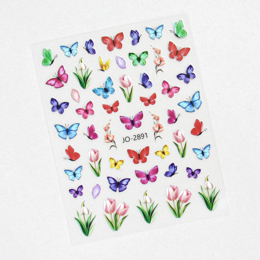 Rdntbeu decals on acrylic press-ons showing durable adhesive and shine