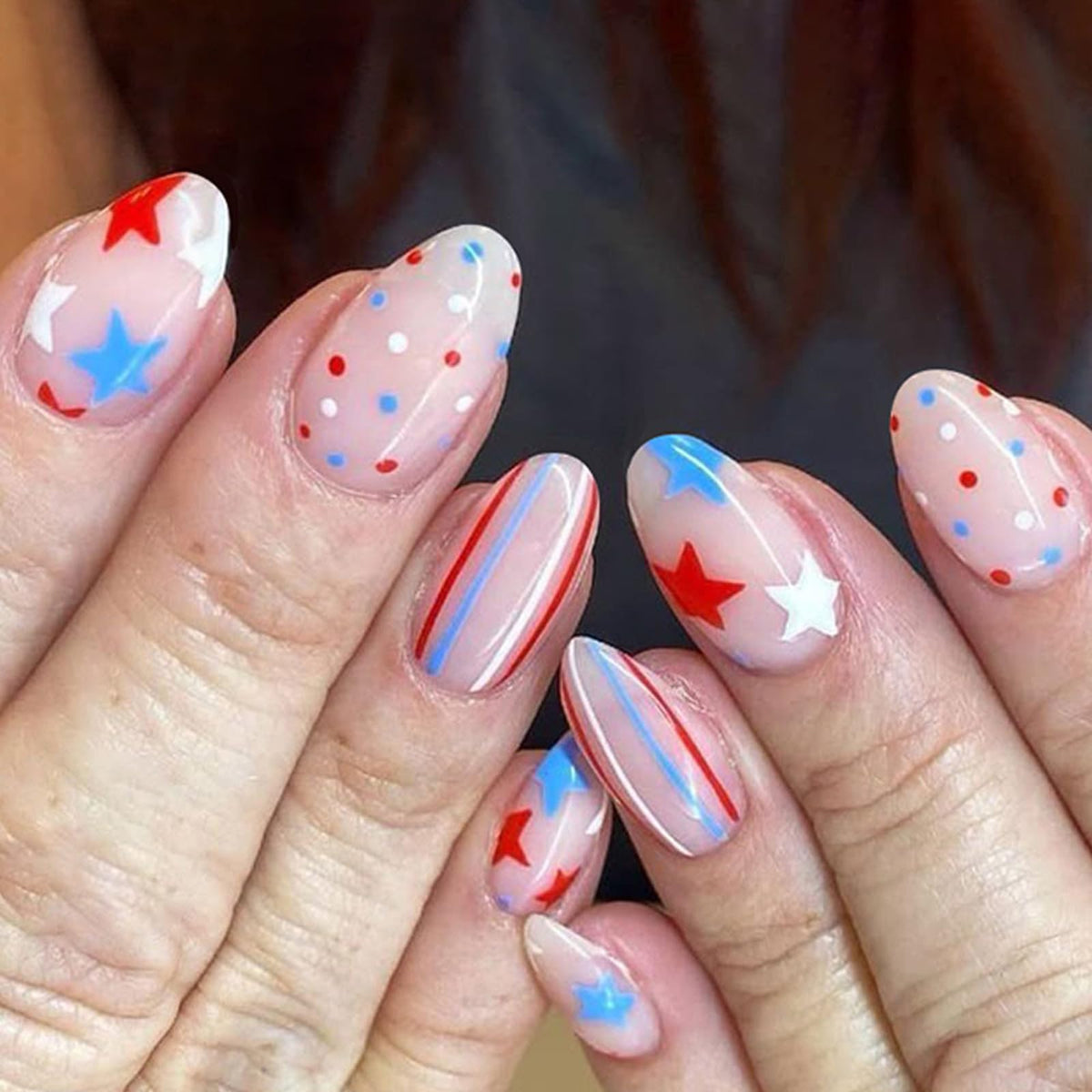 Rdntbeu front packaging showing 24pcs patriotic press-on nails and included tools for convenience