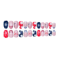 Rdntbeu hand applying a press-on nail illustrating simple at-home manicure steps