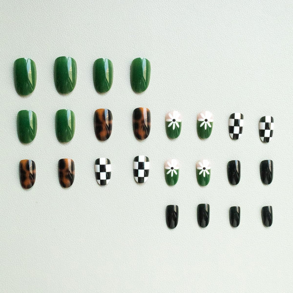 Rdntbeu flat lay of mixed floral, checkered and tortoiseshell nails illustrating pattern variety