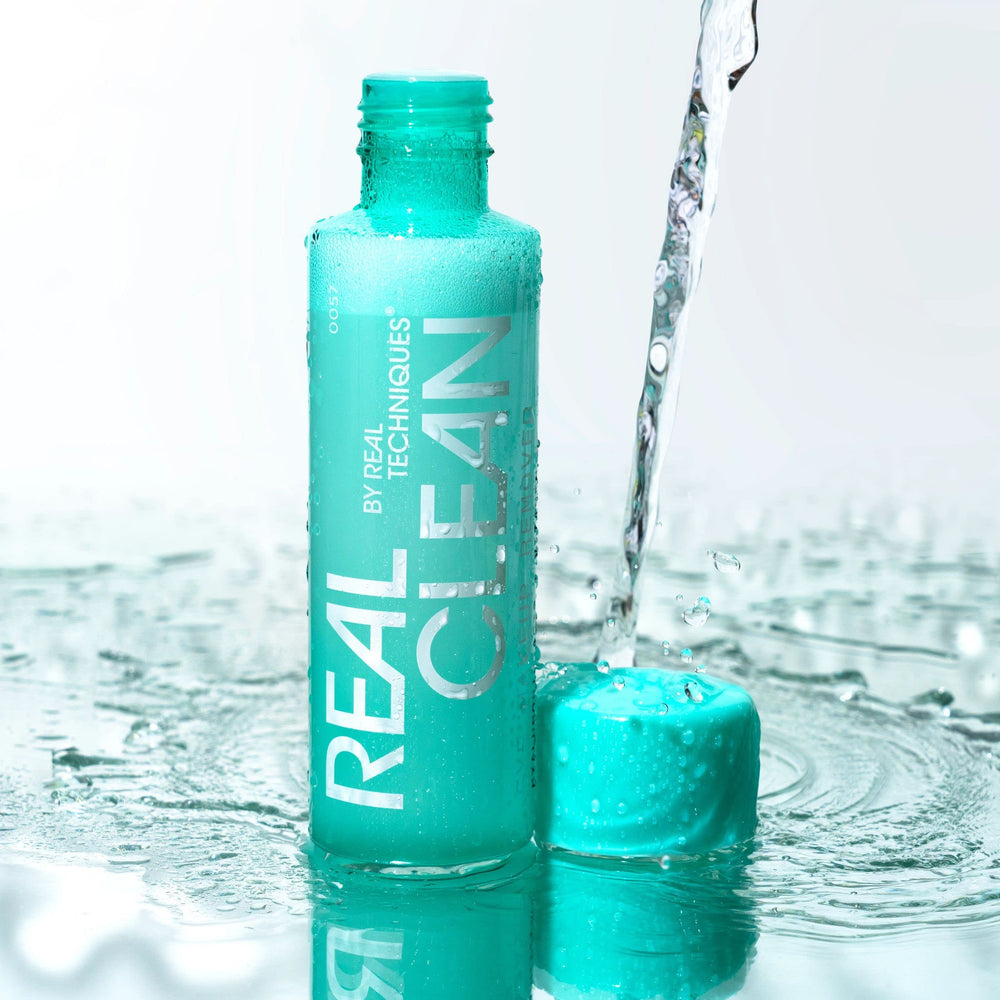 Real Techniques bottle staged in bathroom setting showing daily routine convenience benefit