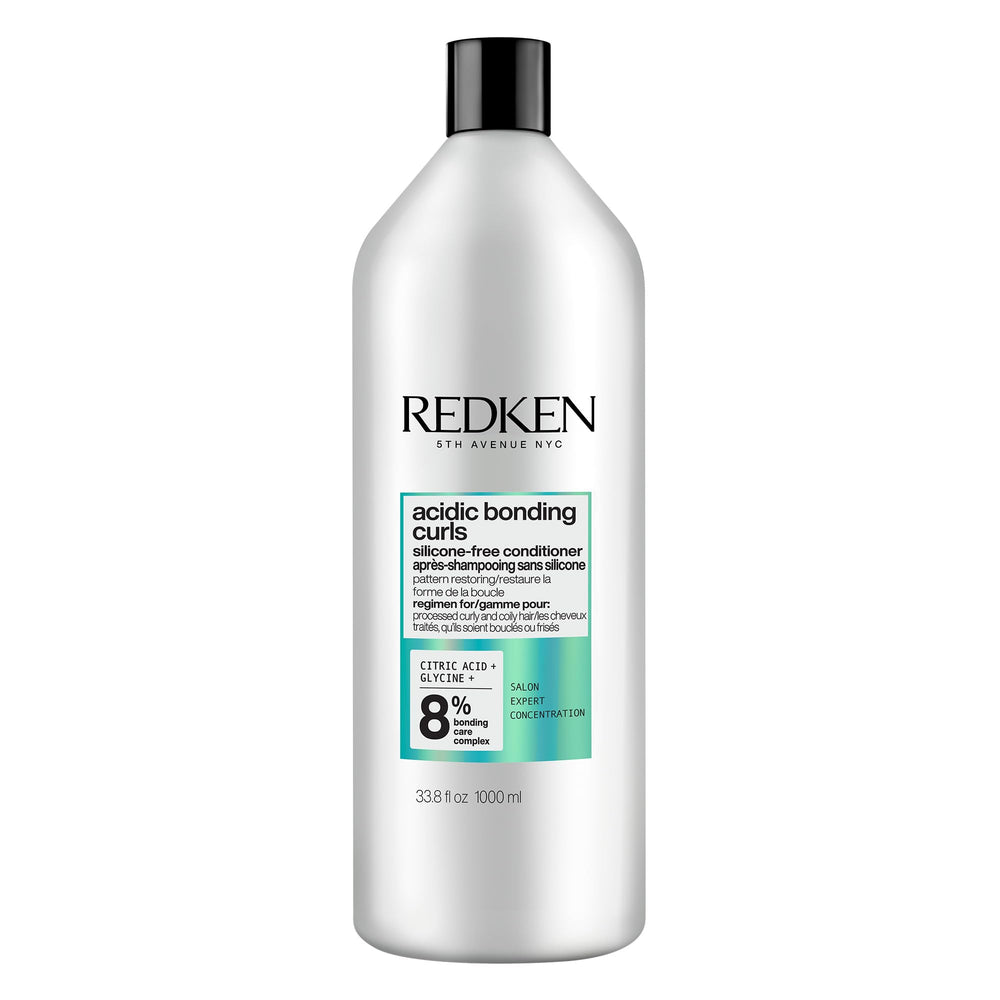 Redken front packaging shows conditioner liter bottle and branding benefits