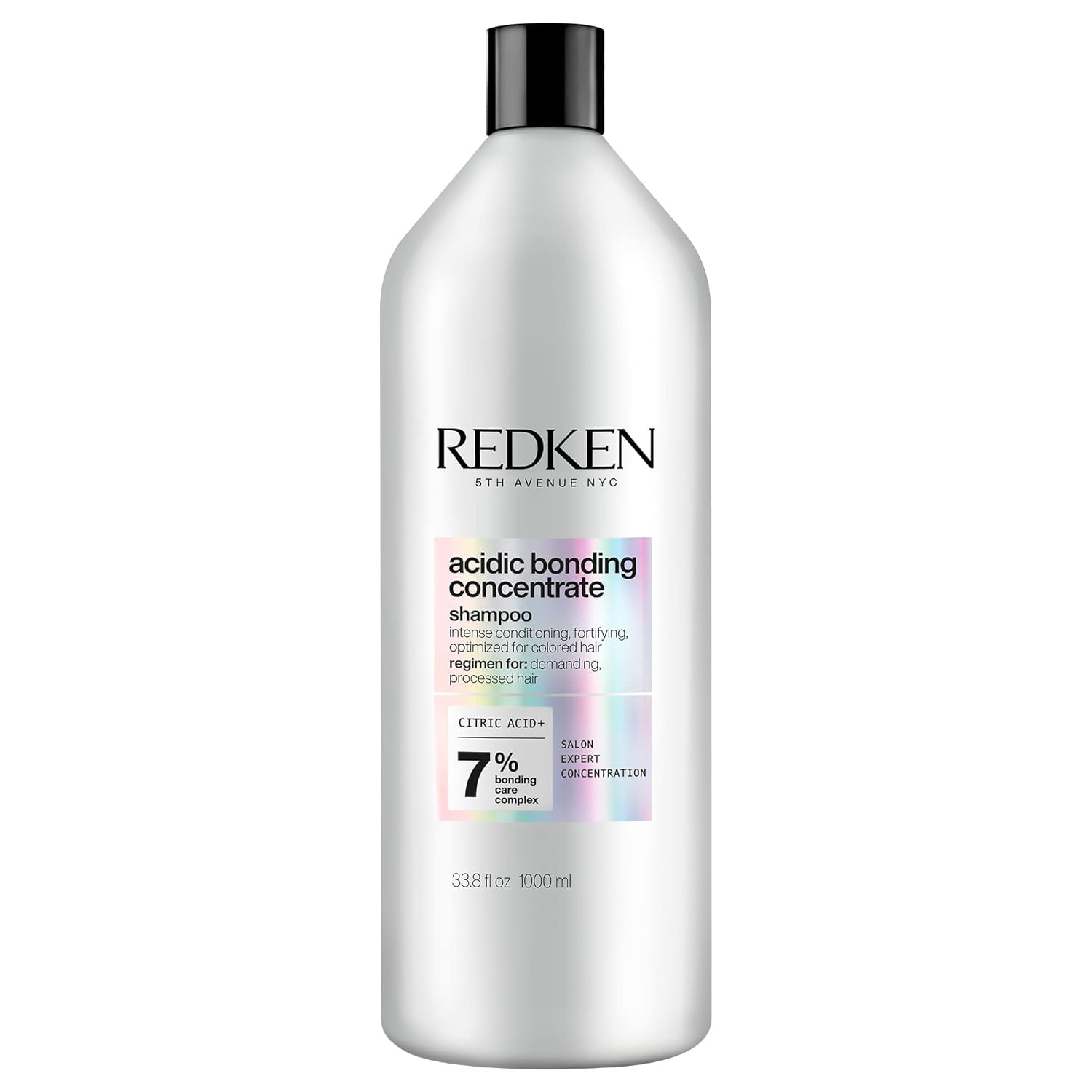 Redken bottle front view showing branding and repair focus benefits