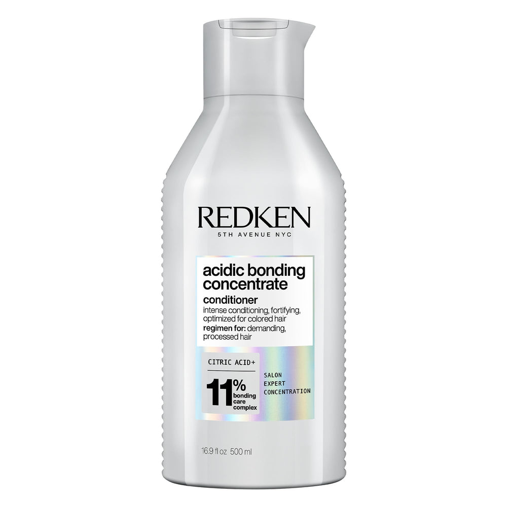 Redken front packaging showing product and strength benefit