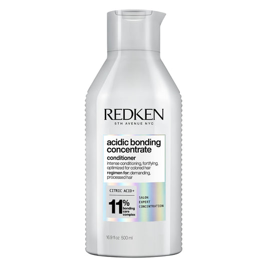 Redken front packaging showing product and strength benefit