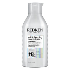 Redken front packaging showing product and strength benefit