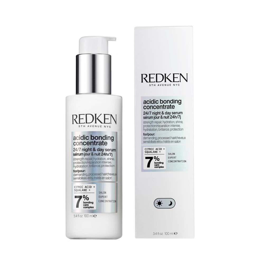 Redken bottle front view showing repair benefits and lightweight finish