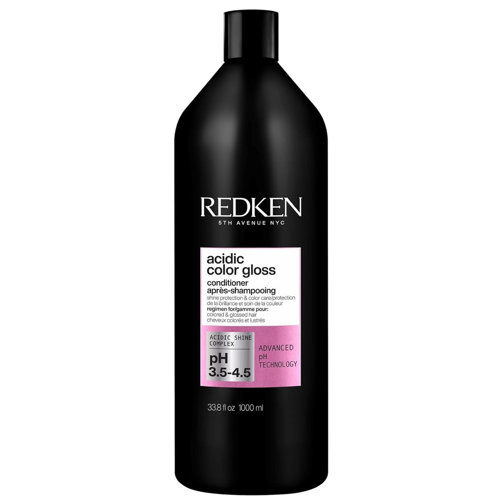 Redken bottle front view showing product and shiny color protection