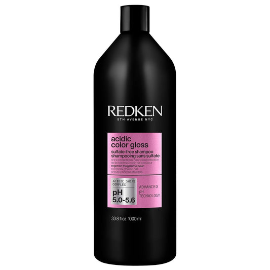 Redken front bottle showing product and branding with clear benefit of color protection