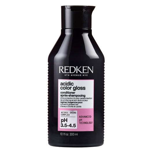 Redken bottle front packaging showing glossy finish and salon branding