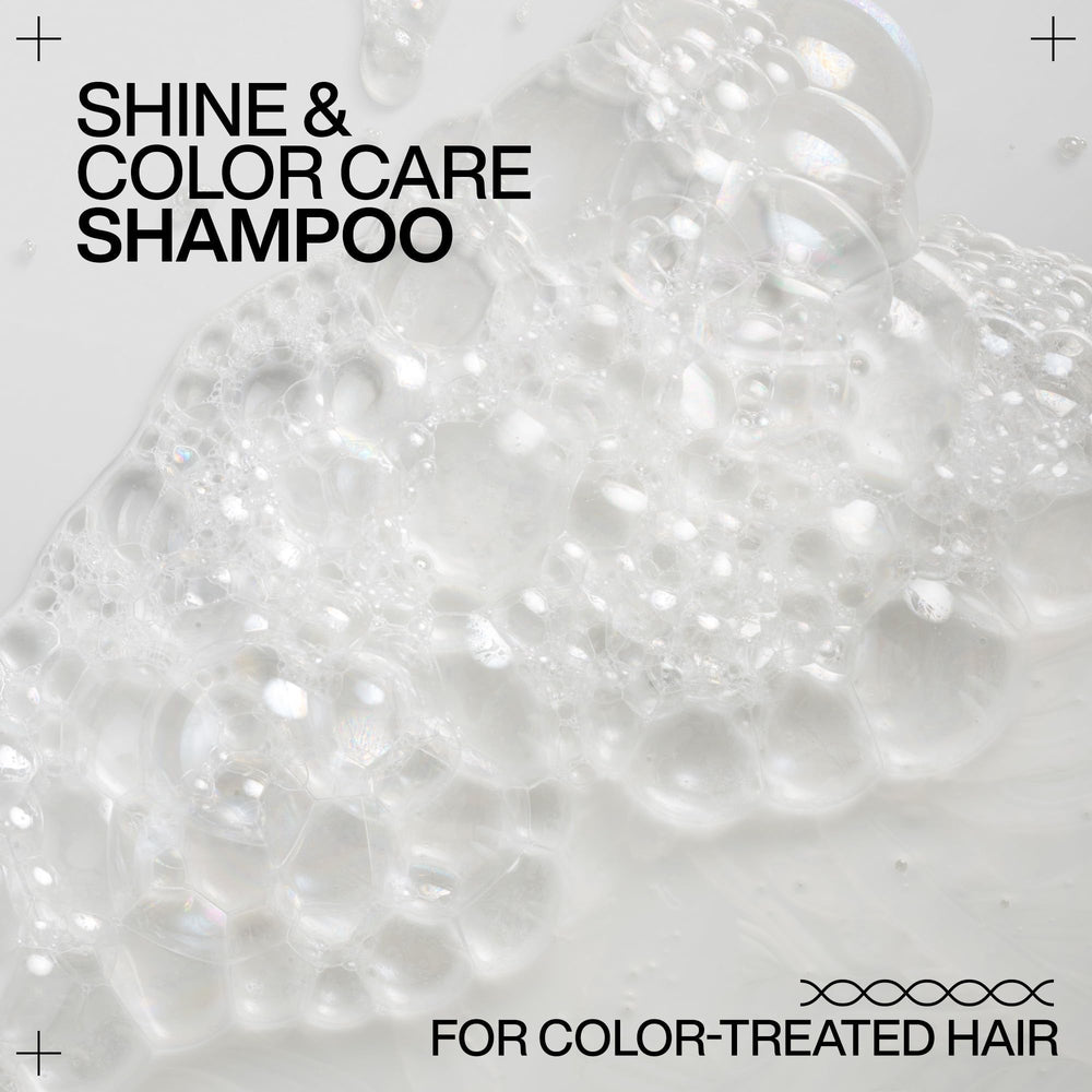 Redken shampoo in shower showing how it seals cuticle for increased shine