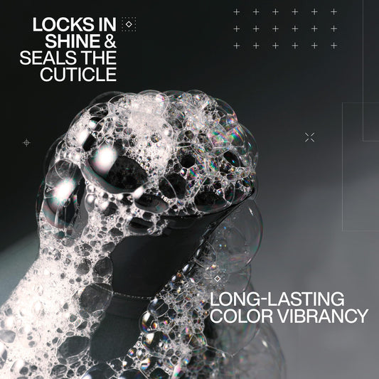 Redken close-up texture on pump highlighting creamy sulfate-free lather