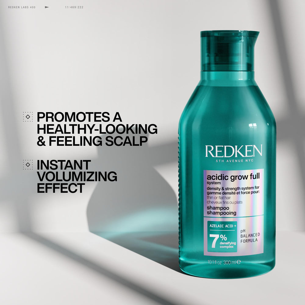 Redken bottle paired with conditioner illustrating system use benefit