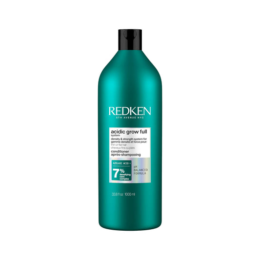 Redken front bottle view showing product and volumizing benefit